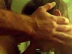 engaging in oral suction practice with deep focus