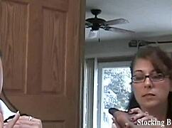 Lesbian threesome in stockings with foot fetish and femdom play