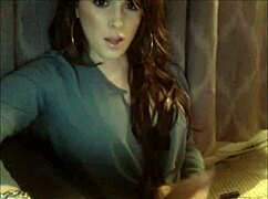 Beautiful transsexual engages in subtle teasing on camera