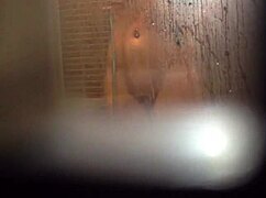 Teen girl caught masturbating her wet pussy in the shower