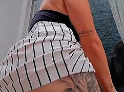 Sexy Redhead Cleans Window And Shows Off To Neighbor