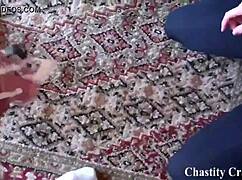 Mistress lets slave suck toes in chastity belt