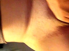 Dirty slut fingers her hairy pussy in a teasing masturbation session