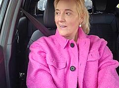 wife teases her pussy during a drive with friend