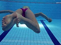 Elena Proklova, the beautiful Russian blonde, shows off underwater with natural tits