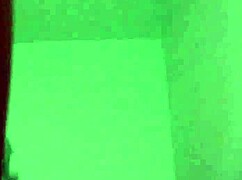 An amateur asian with big tits teases and blows on webcam.