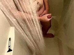 hidden shower cam reveals shaved guy jerking off to cumshot