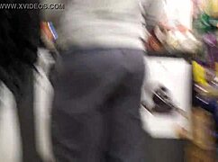 Ebony shorty grabbing booze in Baltimore store, damn she’s bold in public!