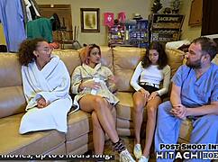 Two hot lesbians strap Channy Crossfire to surgical table for multiple orgasms with Hitachi wand