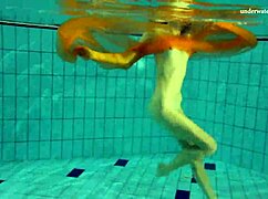 Nastya strips her clothes and shows naked hot body in the pool