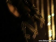 brunette belly dancer undresses teasingly
