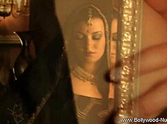 brunette belly dancer undresses teasingly