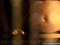 brunette belly dancer undresses teasingly