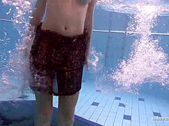 mia naked underwater with big tits! pool fun.