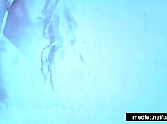 Strippers undress and tease audience erotically.