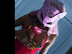 Tropicalpussy teases in red high heels looking so alluring.