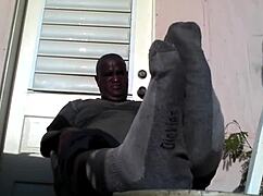 bear black master shows his big feet after work, needs a slave 😏