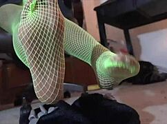 Worship my ebony feet in green fishnets for domination.