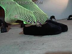 Worship my ebony feet in green fishnets for domination.