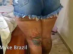 Tattooed mommy takes two big cocks anally and sucks deeply