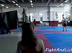 muscular woman licked after wrestling match