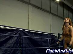 muscular woman licked after wrestling match