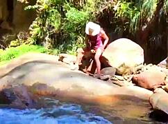 lilyan is masturbating with toys on the river banks.