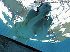 Lada Poleshuk shows big tits underwater in the pool