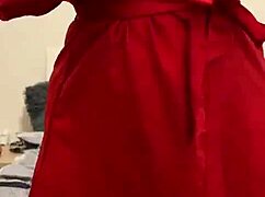 brunette in red lingerie teases her big tits and ass