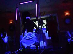 male stripper entertains milfs with glowing show