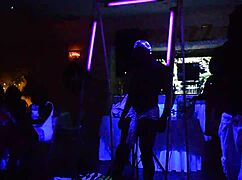 male stripper entertains milfs with glowing show