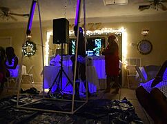 male stripper entertains milfs with glowing show