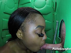 BLACK GIRL SUCKS WHITE DICK AT GLORYHOLE