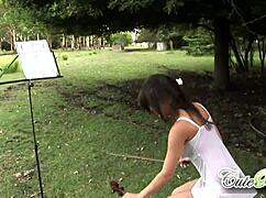 Is this sexy teen 18+ playing with her natural tits nude outdoors?