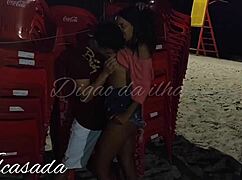 African Couple Kissing and Flashing Ass on Public Beach