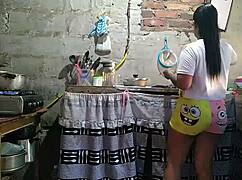 while cooking lunch, horny Paula grabs my butt and licks me.