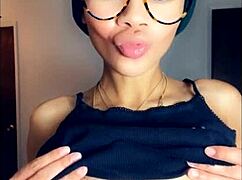 Light skin black girl masturbates showing her prettiest ebony boobs and tits on the internet