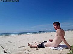 Hey, check out this beach jerk-off session! 😎