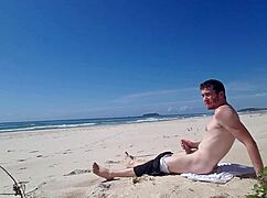 Hey, check out this beach jerk-off session! 😎