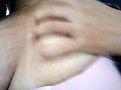 latina touching herself in grandmother's living room