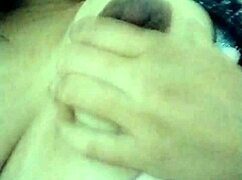 latina touching herself in grandmother's living room