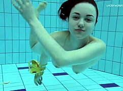i’m obsessed with teen lada’s little tits, naked underwater in the pool.