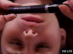 cute brunette fucks her sticky wet pussy with a pen, reaching orgasm