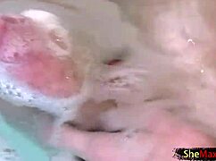 Shemale Teases Tits and Strokes Hard Shecock in Jacuzzi