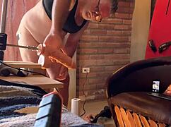 The gay guy gets fucked by the machine in his ass.