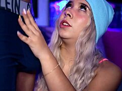 Horny blonde teases boyfriend's cock in boxers.