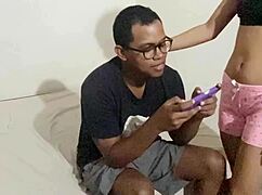 my stepbrother shows me phone games while we get close