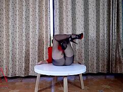 Nice Lady In Pantyhose And Heels Undresses At Round Table