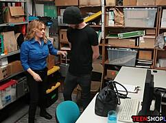 milf lp officer deals with male shoplifter in back office
