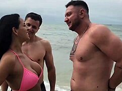 Latina milf meets two african swingers on beach for sex